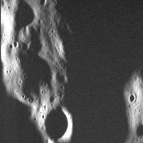 Some see a scary ghost face where other see mountains and craters from Mercury